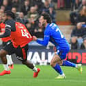 Kasey Palmer has his shirt pulled by Doncaster defender Jamie Sterry - pic: Andy Fitzsimons