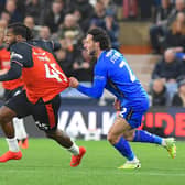 Kasey Palmer has his shirt pulled by Doncaster defender Jamie Sterry - pic: Andy Fitzsimons