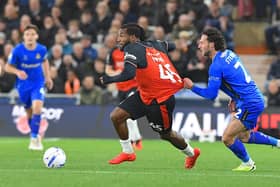 Kasey Palmer has his shirt pulled by Doncaster defender Jamie Sterry - pic: Andy Fitzsimons