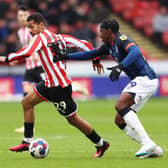 Amari'i Bell gets close to Sheffield United's Iliman Ndiaye on Saturday