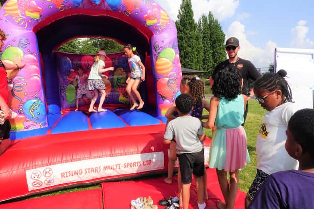 Goats, pigs, donkeys and bouncy castles! This is a school fun day for the whole community
