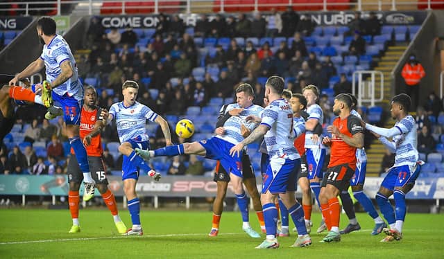 Luton try and win the ball in the area at Reading on Thursday night - pic: Andy Fitzsimons