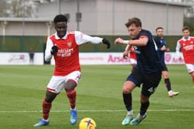 Alfie Doughty looks to get close to Arsenal's Bukayo Saka in their goalless draw at London Colney - pic: Stuart MacFarlane / Getty Images