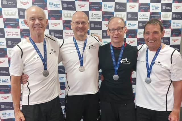 Team Luton's relay team of Colin Mayes, Graham Powell, Dave Wright and Malcolm Barton