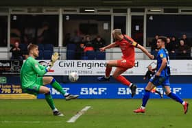 Danny Hylton scores one of his 62 goals for the Hatters - pic: Liam Smith