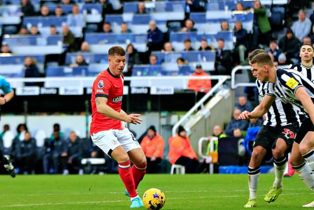 Ross Barkley is about to assist Elijah Adebayo to make it 4-2 against Newcastle on Saturday - pic: Liam Smith