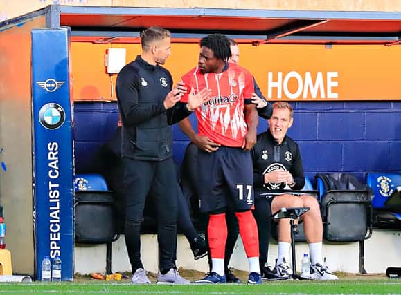 Pelly-Ruddock Mpanzu is given his final instructions by assistant manager Chris Cohen before coming on against Sunderland