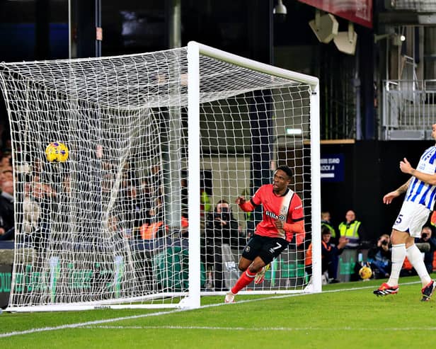 Chiedozie Ogbene puts Luton 2-0 up against Brighton on Tuesday night - pic: Liam Smith