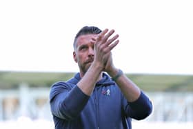 Rob Edwards applauds the Hatters fans after this afternoon's 4-2 defeat at Fulham - pic: Liam Smith