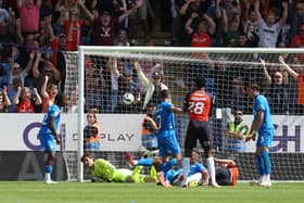 Mads Andersen heads Luton in front against Peterborough on Saturday - pic: Joe Dent/theposh.com