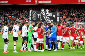 Luton and Nottingham Forest shake hands prior to kick-off at the City Ground on Saturday - pic: Tony Marshall/Getty Images