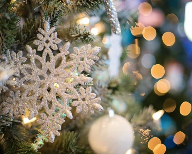 A snowflake ornament on a Christmas tree. Photo: Jill Wellington