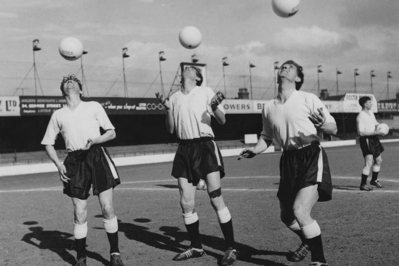 From left to right, George Cummins, John Groves and Billy Bingham training with Wembley balls for the  1959 FA Cup final on 10th April 1959.