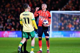 Alfie Doughty has words with Bristol City's Anis Mehmeti on Wednesday night