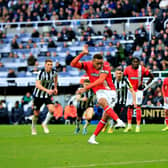 Carlton Morris fires home from the penalty spot against Newcastle - pic: Liam Smith