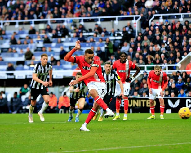 Carlton Morris fires home from the penalty spot against Newcastle - pic: Liam Smith