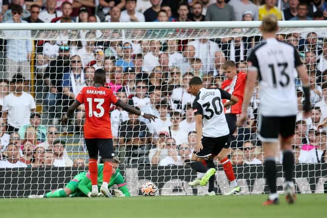 Town defender Mads Andersen is unable to stop Carlos Vinicius scoring the only goal of the game at Craven Cottage - pic: Steve Bardens/Getty Images