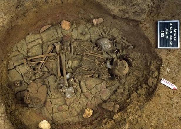 Skeletal remains of an adult and a child at Altwies ""Op dem Boesch"". A similar grave was found at Dunstable Downs. Picture:  Foni Le Brun-Ricalens, Institut National de Recherches Archéologiques, Luxemburg / SWNS