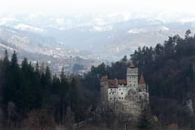 Bran Castle, famous as 'Dracula's Castle', stands among Transylvanian mountains in Bran, Romania