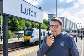 Mick preparing his announcements at Luton train station