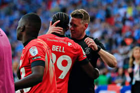 Town boss Rob Edwards with Amari'i Bell after Luton's play-off final win at Wembley