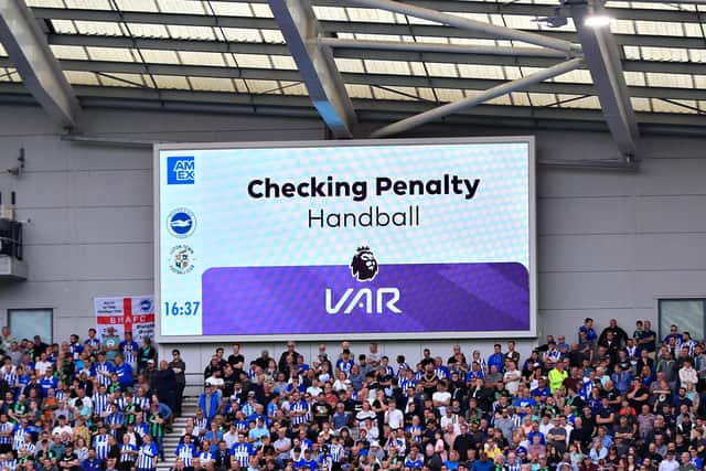 Luton's penalty at Brighton is checked by VAR at the weekend - pic: Liam Smith
