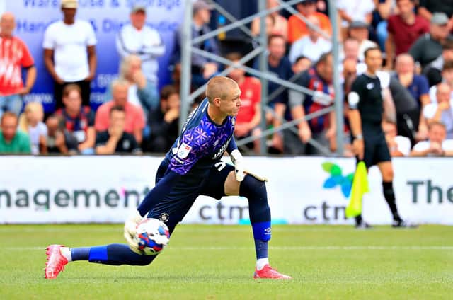 Town keeper Ethan Horvath rolls the ball out during his debut against Birmingham City