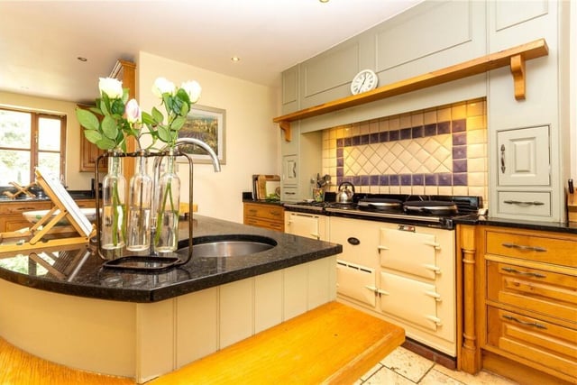 The property includes a stylish kitchen area
