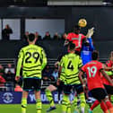Elijah Adebayo rises above David Raya to make it 2-2 against Arsenal on Tuesday night - pic: Liam Smith