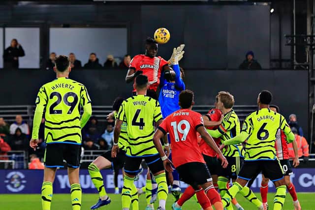 Elijah Adebayo rises above David Raya to make it 2-2 against Arsenal on Tuesday night - pic: Liam Smith