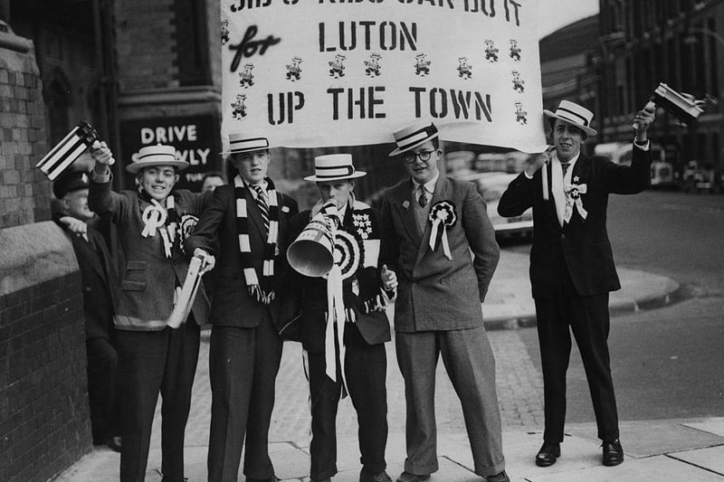 A group of Luton Town supporters, at London's St Pancras station on their way to the FA Cup Final against Nottingham Forest at Wembley. Luton Town lost the final 2-1.
