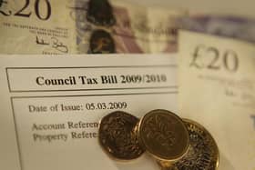 Council Tax Bill with coins. Photo by Peter Macdiarmid/Getty Images