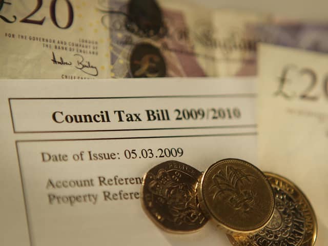 Council Tax Bill with coins. Photo by Peter Macdiarmid/Getty Images
