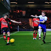 Reece Burke sends over a cross during Luton's 1-1 draw with Wigan in the FA Cup