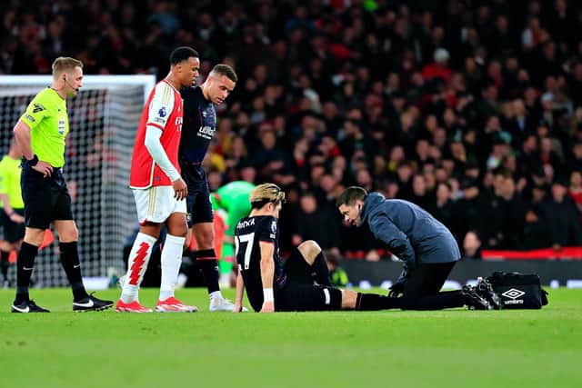 Daiki Hashioka receives treatment during Wednesday night's 2-0 defeat to Arsenal - pic: Liam Smith