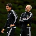 New Luton assistant Paul Trollope shares a joke with former Wales manager Chris Coleman during his time with the national side