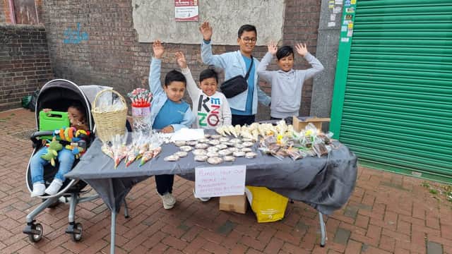 The boys at their bake sale which raised more than £460