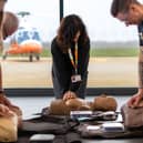 Magpas Air Ambulance CPR Training Lead Nicola Cooper teaching the lifesaving skill