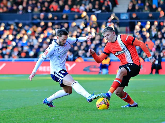 Alfie Doughty looks to get away on the wing against Bolton - pic: Liam Smith