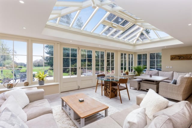 This has to be the best part of this whole house! This orangery has been finished to an impeccable standard - the doors and windows make the countryside in the distance seem like Tuscany. A room like this is perfect for relaxing after a hard day