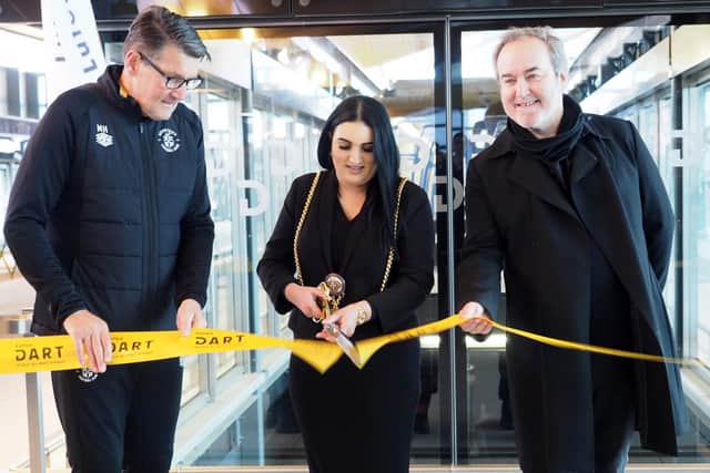 ,Mayor of Luton Councillor Sameera Saleem was joined by Luton Town Football Club legend Mick Harford and Grammy Award-winning Luton-born film composer David Arnold to cut a ribbon. - photo Tony Margiocchi