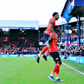 Elijah Adebayo and Jacob Brown celebrate Luton's opener against Manchester City - pic: Liam Smith