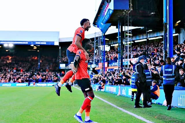 Elijah Adebayo and Jacob Brown celebrate Luton's opener against Manchester City - pic: Liam Smith