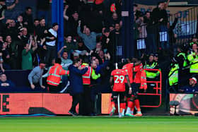 Gabe Osho is mobbed after opening the scoring for Luton against Sunderland
