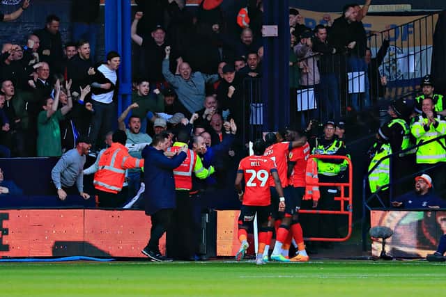 Gabe Osho is mobbed after opening the scoring for Luton against Sunderland