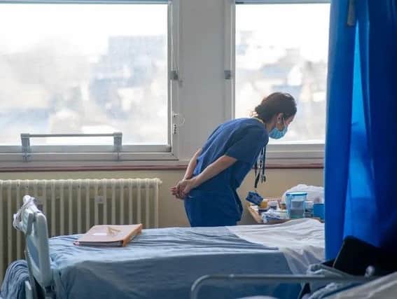 A general view of staff on a NHS hospital ward at Ealing Hospital in London. Picture: Jeff Moore via PA