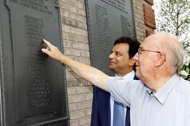 David Cook proudly shows Chairman of Strawberry Star, Santhosh Gowda, his grandfather’s name displayed on the memorial.