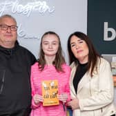 Teri-Rose pictured with her parents at the book launch