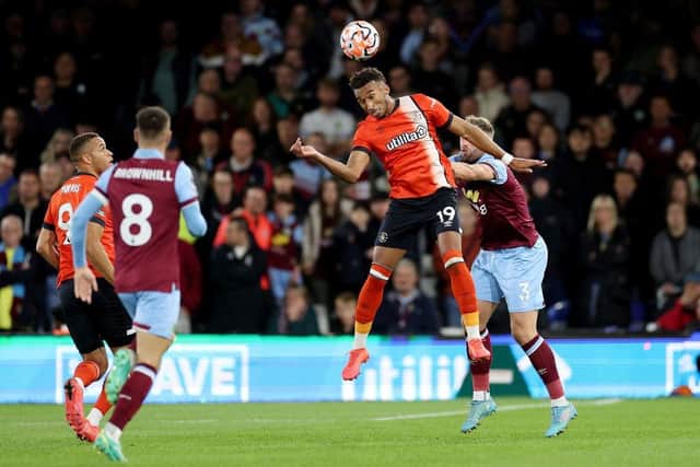 Jacob Brown wins an aerial battle against Burnley on Tuesday night - pic: Warren Little/Getty Images