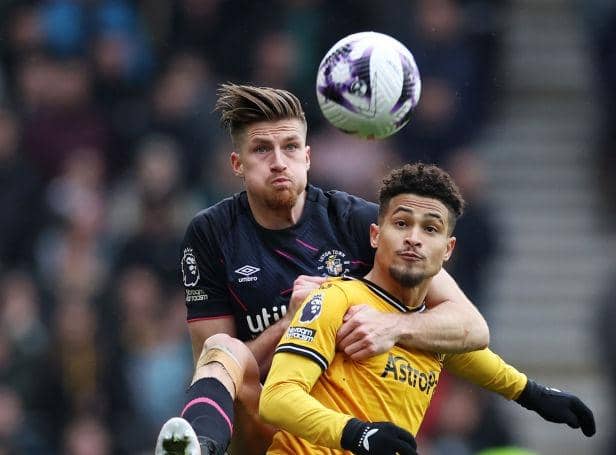 Town defender Reece Burke battles for the ball at Wolves on Saturday - pic: Michael Steele/Getty Images